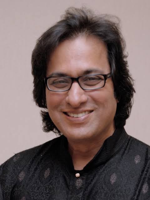Talat Aziz